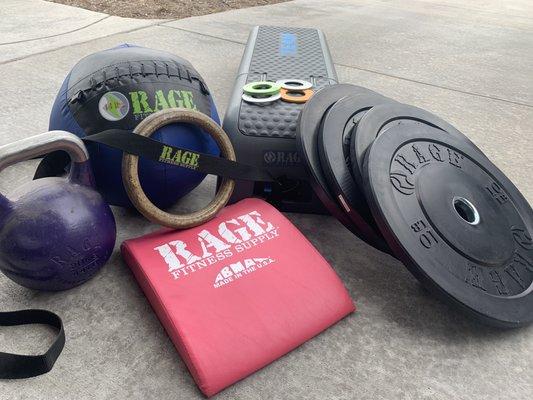 Bumper plates, rings, kettle bell, wall ball, fractional plates, bench