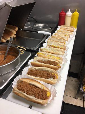 The Classic: A Hot Dog All the Way (Mustard, Homemade Chili, and Fresh Chopped Onion) $1.89 with tax.