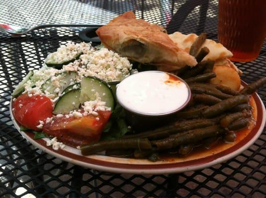 Lunch portion of the Vegetarian Plate: Greek salad, spinach pie (spanakopita), Greek-style green beans, grilled pita & tzatziki