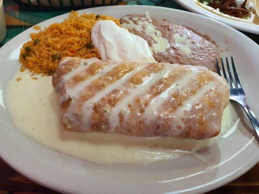 Steak chimichanga beans and rice.