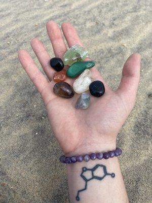 Black tourmaline x2, green citrine, orange calcite, fluorite, carnelian, Smokey quartz, malachite, and the bracelet is lepidolite .