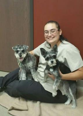 Dr. Sanchez playing with the boarding babies before they go to bed.