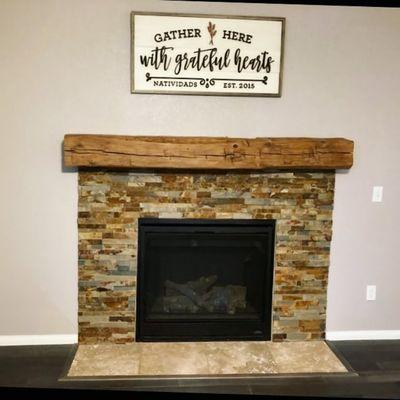 Hand hewn mantel beam