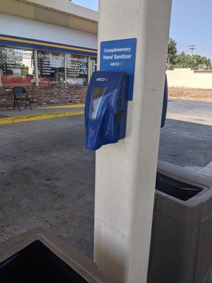 Hand sanitizer stations at the pump