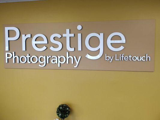 interior wall signage for prestige photography by lifetouch