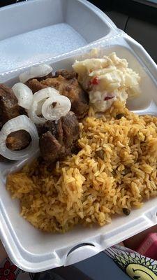 Carne frita, arroz congandules & potatoe salad