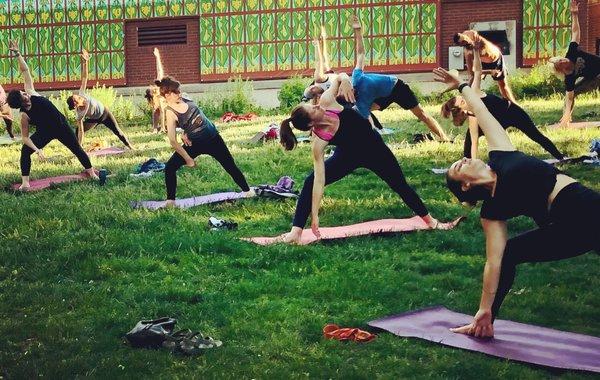 Outdoor yoga in the Summer at the Bucktown Green!