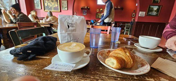 A really good croissant, and very mediocre latte, and a bag of day-olds