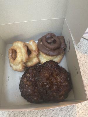 Some apple fritters, chocolate and glaze donuts!