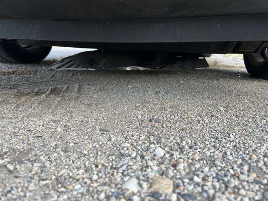 Brought my car in for a routine oil change, but they failed to properly secure the undercarriage metal plate.