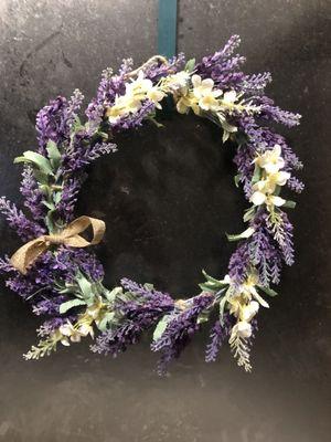 Spring wreath I made for $10 with Dollar Tree flowers and twine