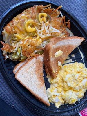 2 egg breakfast with toast and hash browns smothered/covered/peppered. Yum!