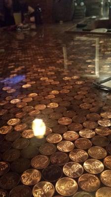 Pennies that make up the bar top