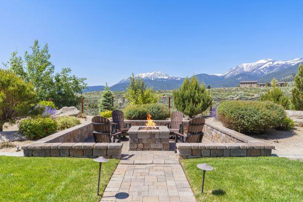 Sunken natural gas fire pit. perfect for entertaining.