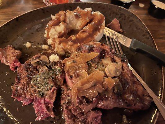 Rare ribeye with mushrooms & onions, and mashed potatoes with dark gravy.  Potatoes and gravy were outstanding.