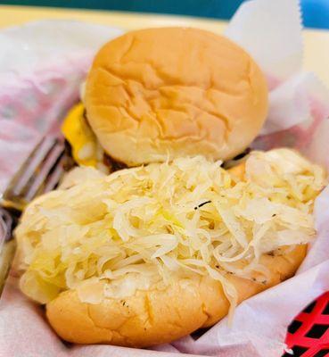 Hot dog with sauerkraut and a cheeseburger