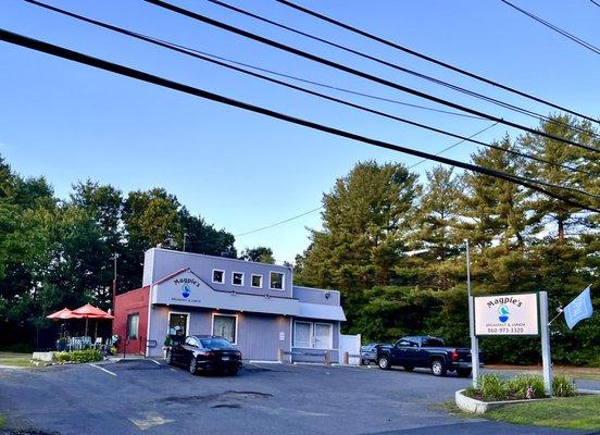 Restaurant, sign and parking