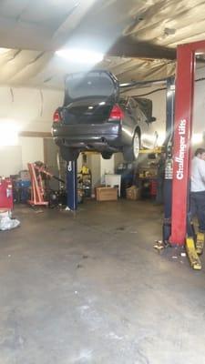 My 2008 BMW 335I E90 on the lift, getting the FMIC installed.