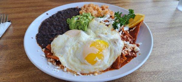 Chilequiles with egg. Rice and beans