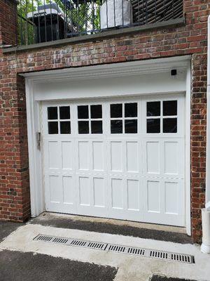 door frame done and repaired, brickwork completed and garage door rehung - works perfectly.