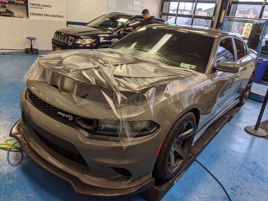 XPEL Stealth installed on the hood to keep the satin finish of the paint