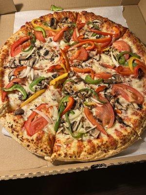 Veggie pizza -large. Veggies seem fresh - they still have a little crunch. better than expected.