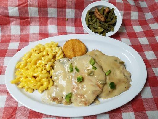 Tuesday's Special: Smothered Pork Chops served with two sides