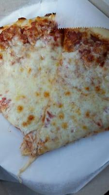 Two slices of pizza. The crust was thicker than what you normally get at an independent pizzeria.