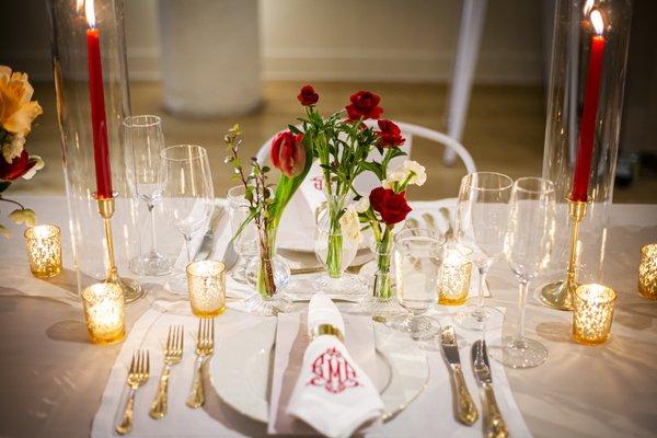 Flowers by Field and Florist,  and silverware from Tablescapes.