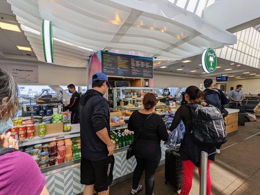 Dolores Park Cafe. Located near Gate C3, Boarding Area C, Terminal 2. Outside. Storefront.