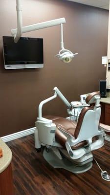 One of doctors opprotories. There is a massage chair and TV in each room for patients to enjoy.