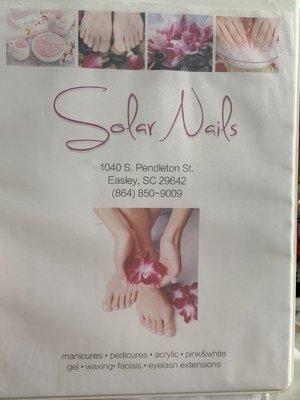 Solar Nails. They have a notebook that lists the products and services they offer.