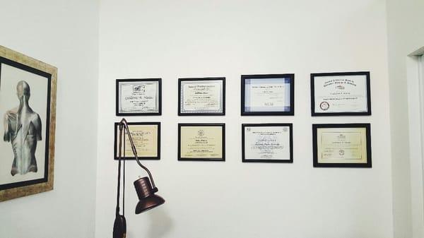 Some of his many diplomas