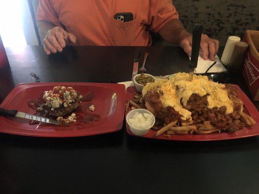 burger with bleu cheese on left,  one armed bandit chili cheese on the right