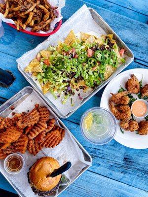 Burger, coconut shrimp, nachos