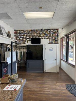 Wall of police, fire and military patches