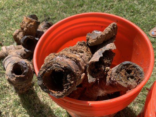 Old cast iron pipes removed by 100% plumbing.