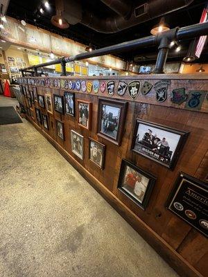 Entrance contains photos of service men and women, including local first responders.  They also have badges all over the restaurant.