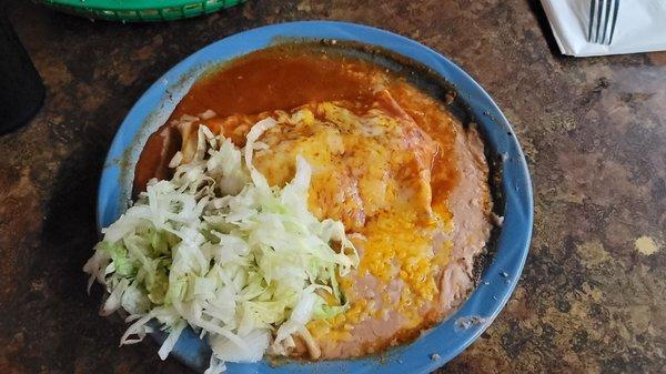 Green Chili Burro Enchilada Style with a side of beans.