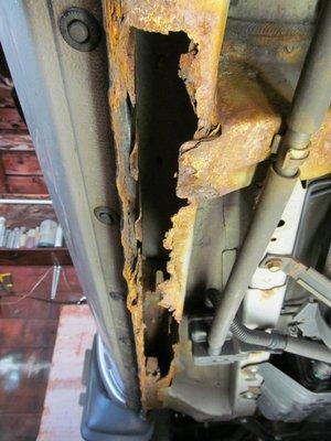 Rust on unibody frame left hand side 3 feet long