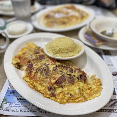 Tel Aviv omelette (I asked for a rice substitute for home fries), short stack of banana walnut pancakes in the back