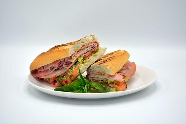 Italian Hero: French Bread, Mortadella, Salami, Ham, Provolone, Parmesan, Basil, Tomatoes, 
 Lettuce, Pepperoncini Peppers & Vinaigrette