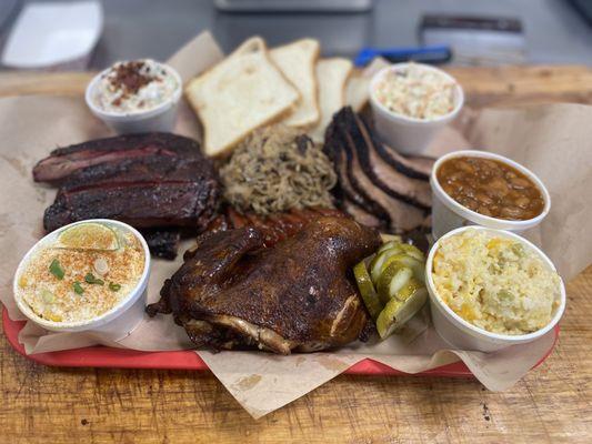 Mutton Buster Platter - Feeds 3-4 people. 1/2 LB of Sliced Brisket, Pulled Pork, Half Rack of Ribs, BBQ Half Chicken, Sausage and sides