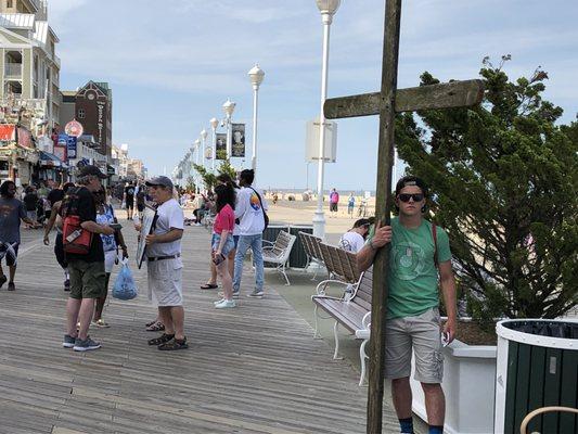 Boardwalk Outreach With Cross And Prayer Sign