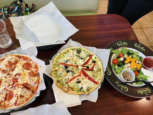 Rustic pizza, Greek pizza, and a fresh salad