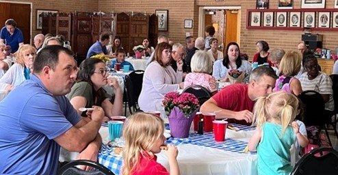 Folks listening at annual congregation meeting