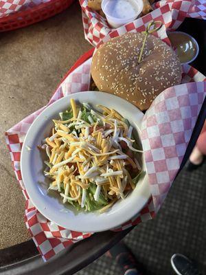 Burger and side salad