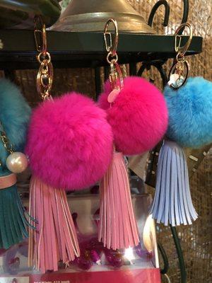 Adorable tassels with pom poms. $18. Thinking about getting a pink one