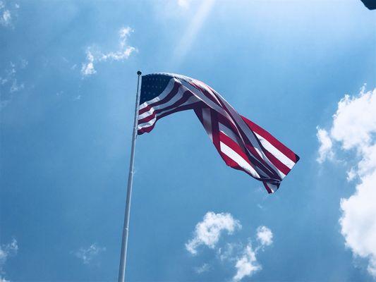 Large US Flag flying over this restaurant.