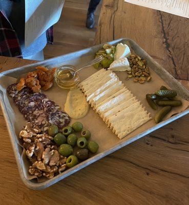 Brunet cheese and elk sausage charcuterie with accompaniments ($26)